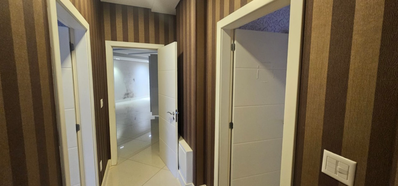 APARTAMENTO N° 102 DO RESIDENCIAL GREENPARK E TRÊS VAGAS DE GARAGEM N° 12 E N° 41 (DUPLA), localizado em Caxias Do Sul - RS