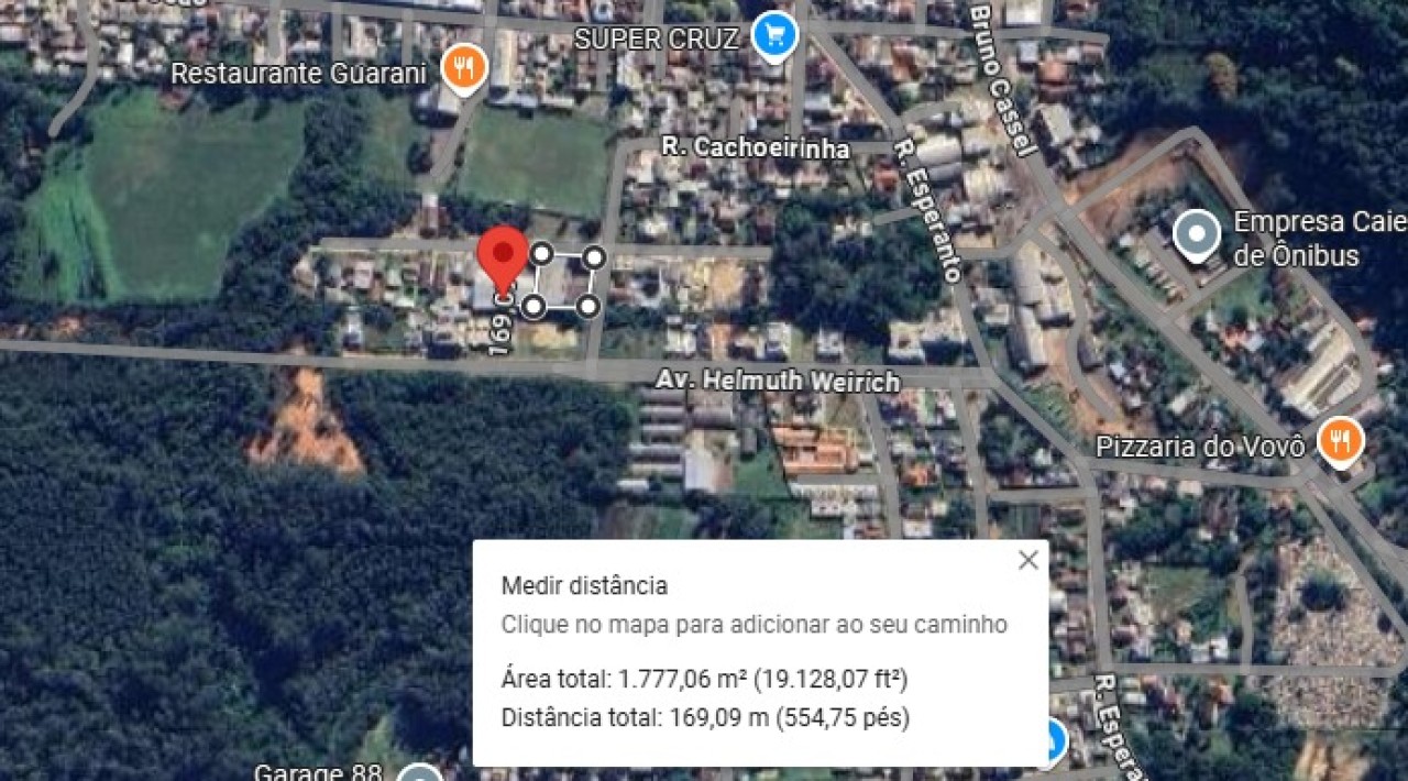 DOIS PAVILHÕES E CASA DE MADEIRA DE DOIS ANDARES SOBRE TERRENO COM ÁREA DE 3.831,74m² EM SÃO SEBASTIÃO DO CAÍ, localizado em São Sebastião Do Caí - RS